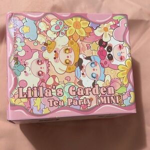 Liila’s Garden Tea Party Mini keychain pendant